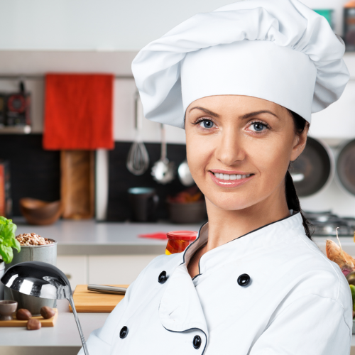 Professional Female Chef in Modern Kitchen