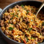 Delicious one-pot ground beef and orzo dish served in a bowl