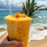 Beach Bum Tropical Smoothie with fresh fruits in a glass